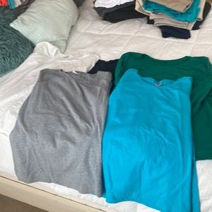 Womens Danskin Now. Five long sleeve shirts.